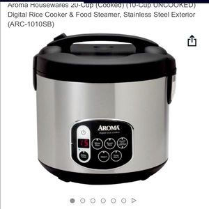Aroma rice Digital Rice Cooker with booklet included. Used twice.